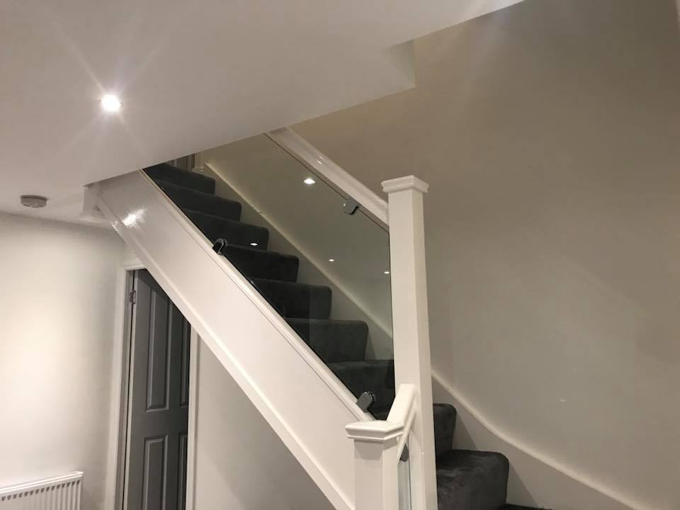 new staircase installed with glass instead of the spindles