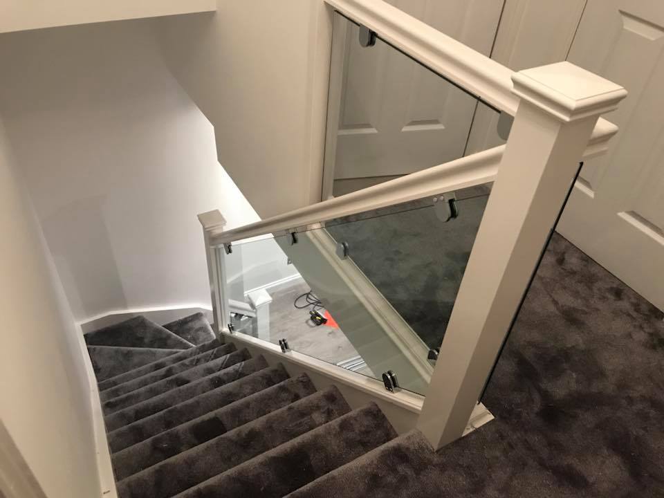 new staircase installed with glass instead of the spindles