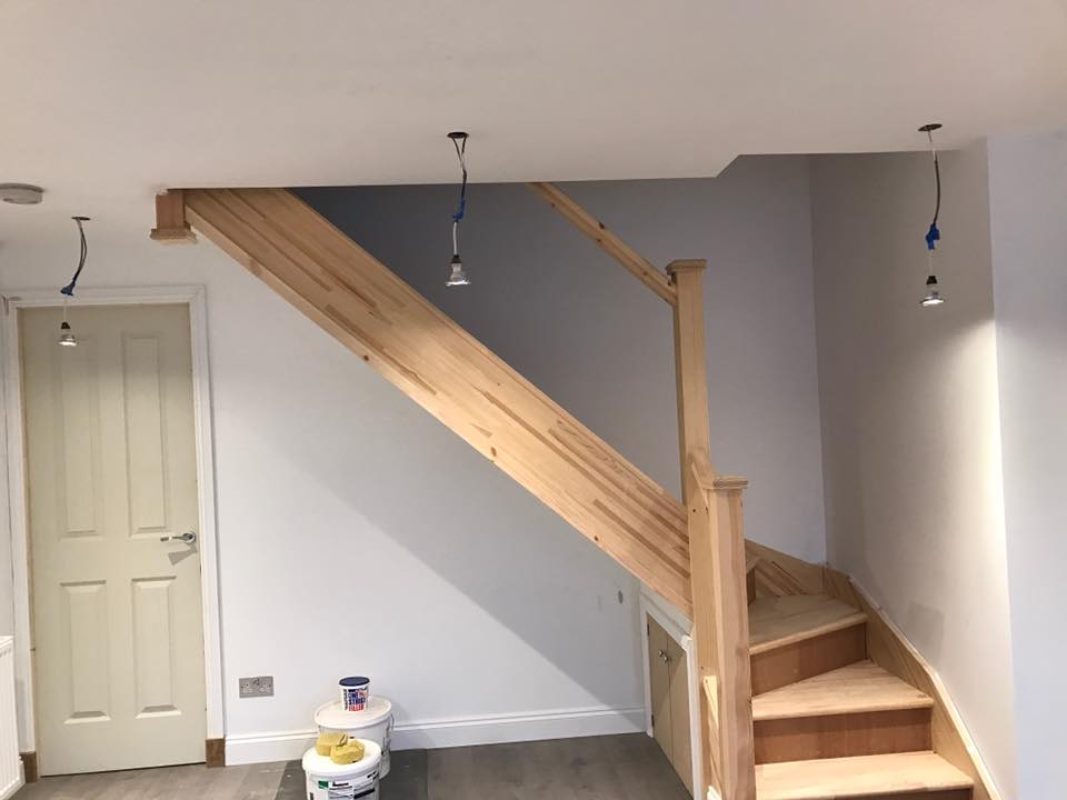 new staircase installed with glass instead of the spindles