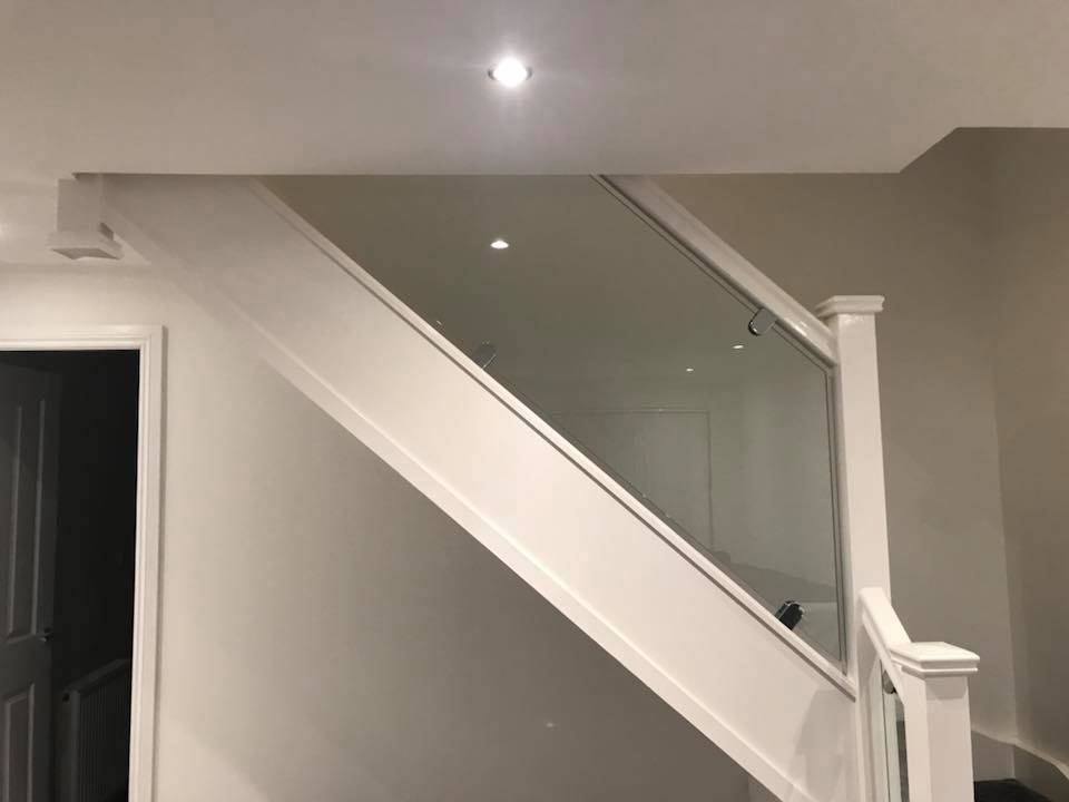 new staircase installed with glass instead of the spindles