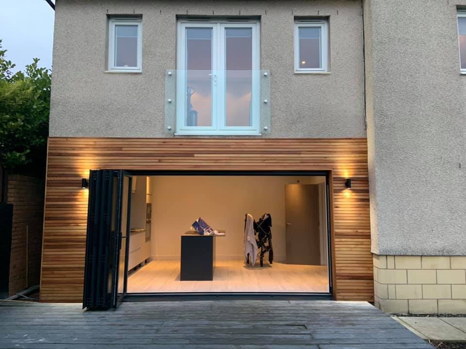 Here we removed the existing windows and patio door and cut out for 3.9m anthracite grey bifolds to open out in to the garden. K9 lintel fitted externally and steel internally
