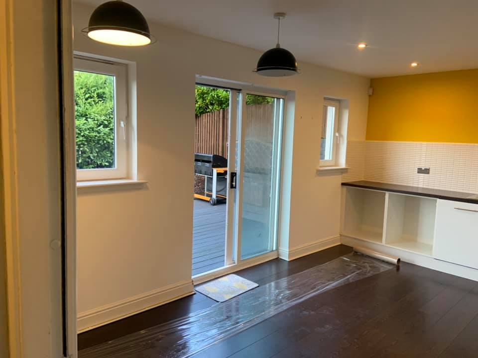 Here we removed the existing windows and patio door and cut out for 3.9m anthracite grey bifolds to open out in to the garden. K9 lintel fitted externally and steel internally